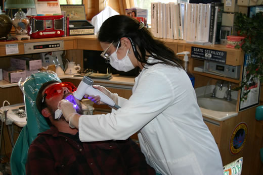 Patient getting an oral cancer scan at Tuckerton Dental