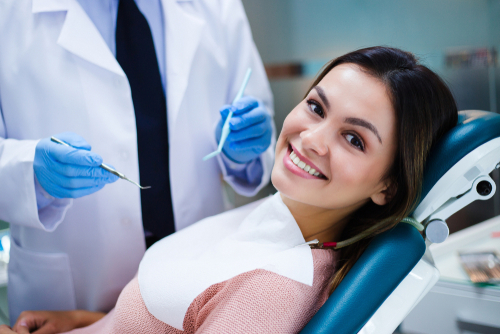 woman smiling in dentist chair