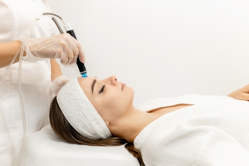 woman getting hydrafacial treatment
